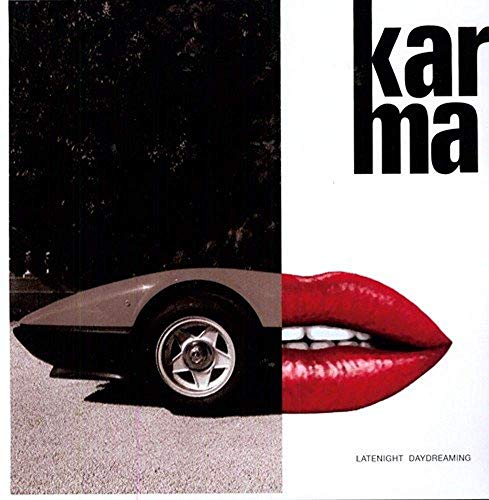 Vinyl album cover with a car, red lips, and bold text.