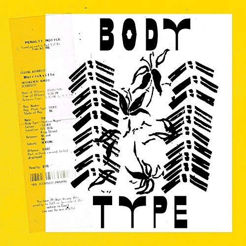 Black and white abstract floral design on a yellow vinyl record cover.