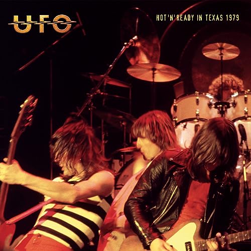 UFO band performing live on stage with instruments, 1979 album cover.