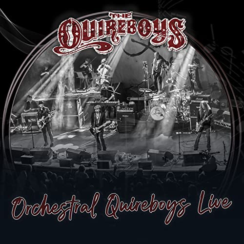 The Quireboys band performing live on stage, black and white image.