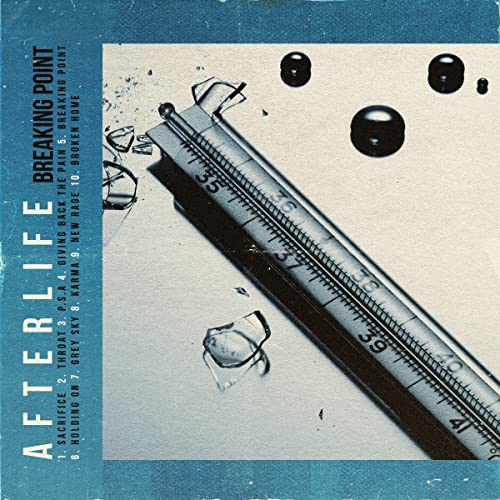 Vinyl album cover: syringe, shattered glass, and blue textured background.