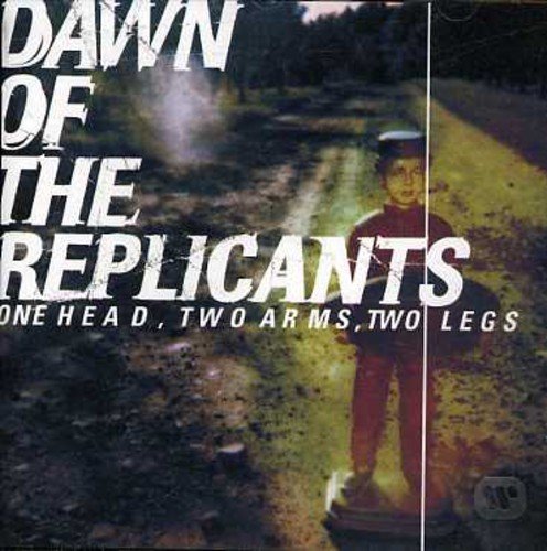 CD cover: a young person in a cap stands on a dirt road.
