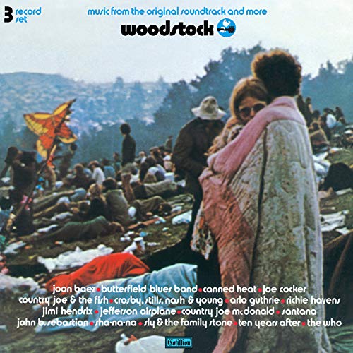 Woodstock triple vinyl record cover with a crowd scene and butterfly.