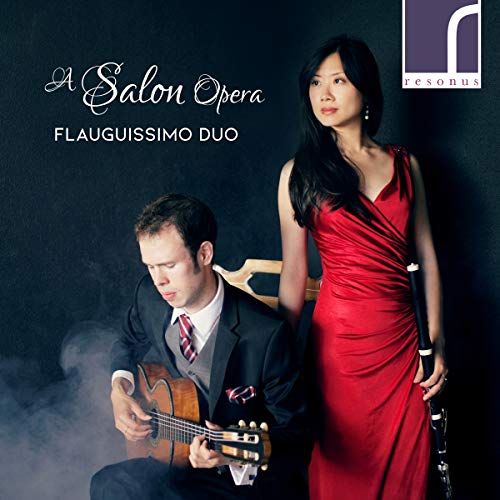 CD cover featuring a woman in red and a man with a guitar.