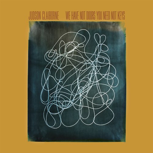 Album cover: abstract white lines on a dark, textured gold background.