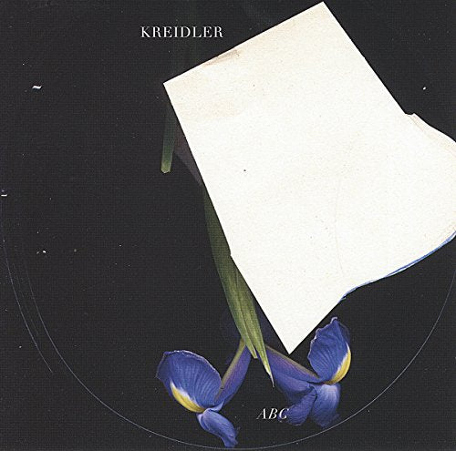 CD cover for Kreidler’s “ABC” featuring irises and a white form.