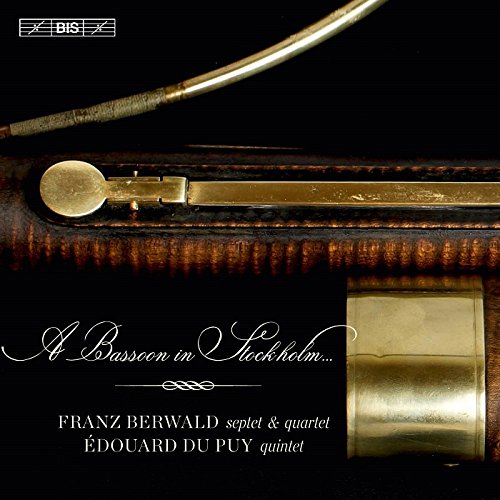 CD cover featuring a close-up of a wooden bassoon with brass details.