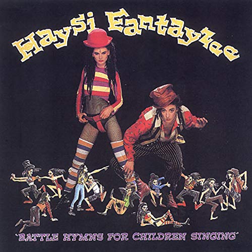 CD cover: two people in colorful outfits with miniature figures.