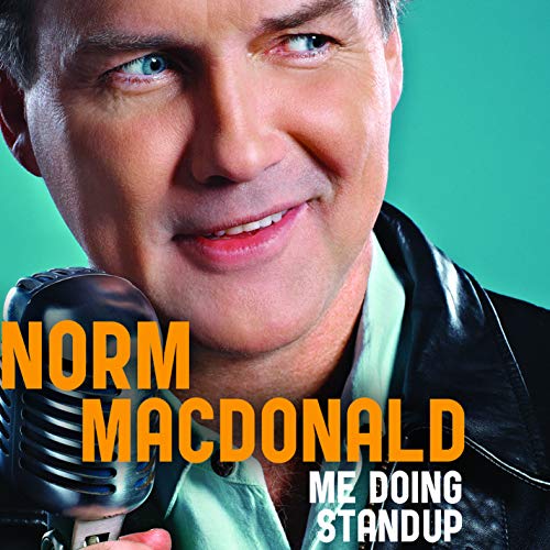 Norm Macdonald’s CD cover featuring a smiling portrait and microphone.