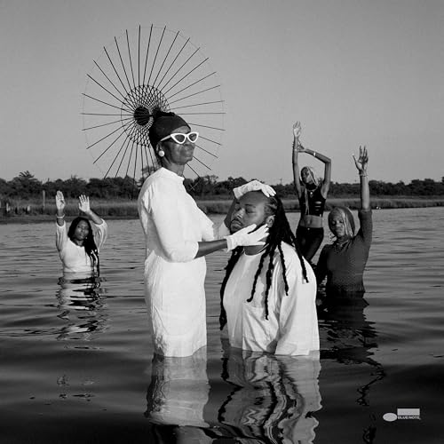 Black and white album cover featuring people in water, reaching upwards.