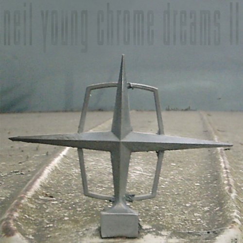 Neil Young’s “Chrome Dreams II” album cover featuring a metal compass sculpture.