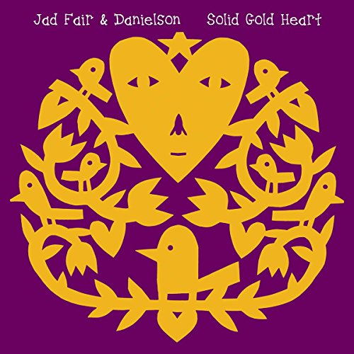 Album cover: gold folk art heart, birds, and floral design on purple.