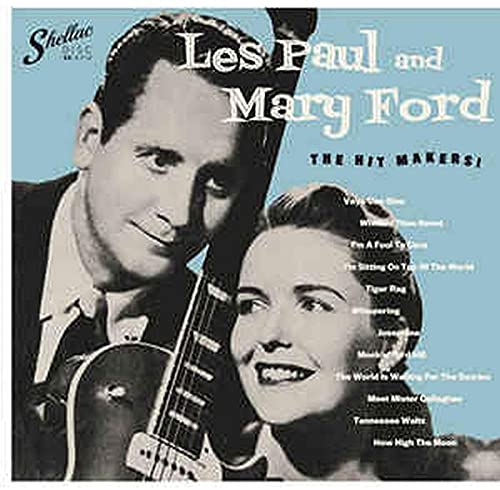 Vintage record album cover featuring Les Paul and Mary Ford in black and white.