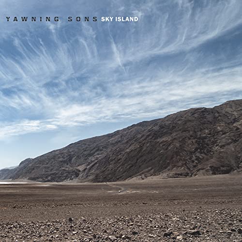 CD cover for Yawning Sonsā āSky Islandā featuring a mountainous landscape.