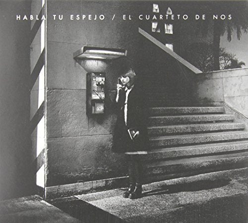 Black and white album cover featuring a person using a payphone.