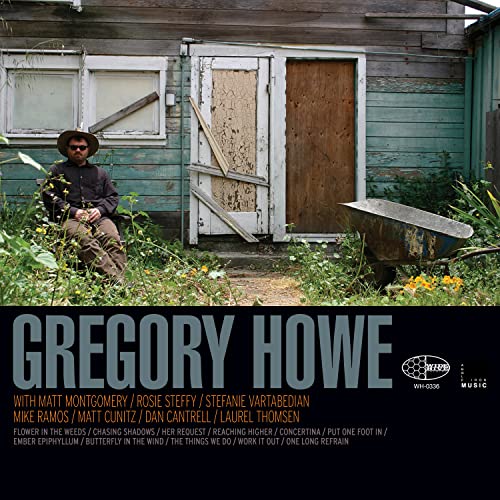 Album cover for Gregory Howe featuring a man sitting in front of a weathered building.