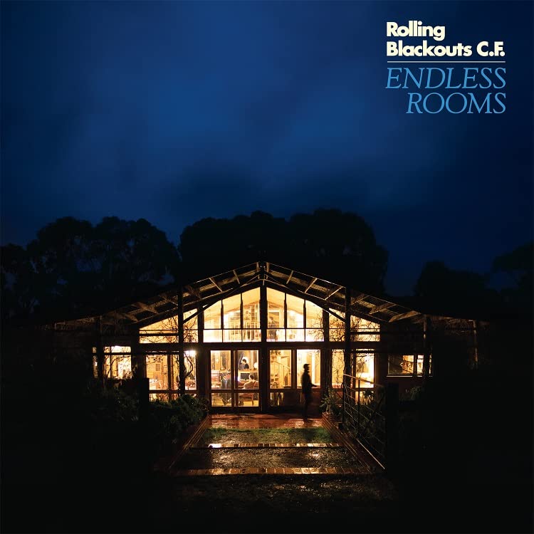 Album cover: illuminated modern house at dusk, dark trees surrounding.