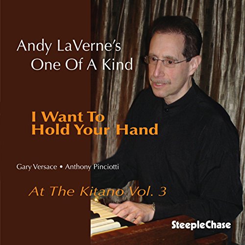 CD cover featuring pianist Andy Laverne with text and brown background.