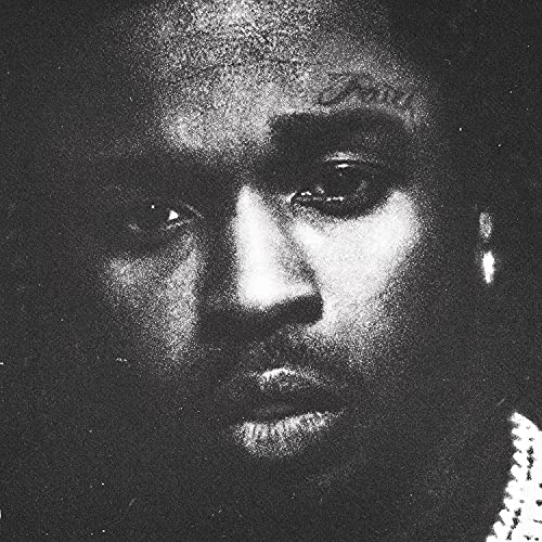 Black and white portrait of Pop Smoke, close-up, with jewelry.