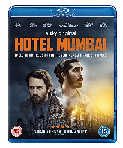Blu-ray cover for Hotel Mumbai featuring two men over a burning building.