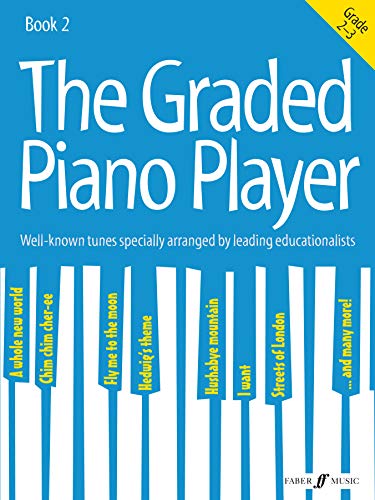 Blue piano music book cover with white title text, grades 2-3.