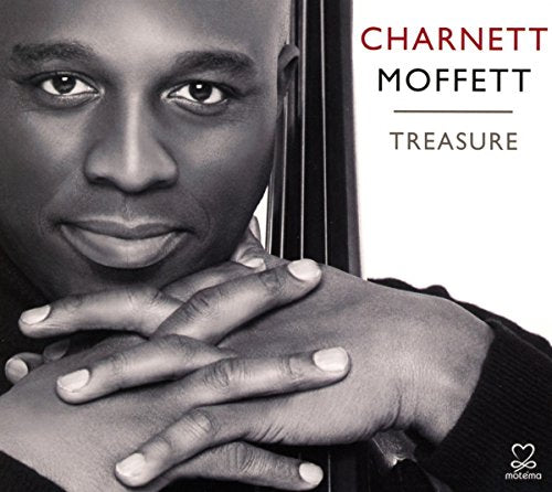 Black and white portrait of Charnett Moffett with a bass, album cover.