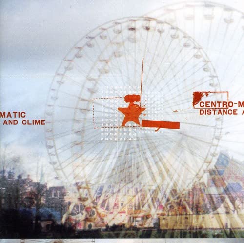 CD cover with a Ferris wheel, grid overlay, and red starburst.