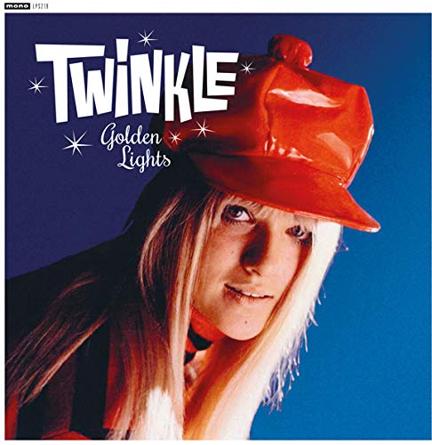 Vinyl record cover featuring a woman with a red hat and blonde hair.