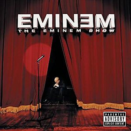 Album cover for Eminem’s “The Eminem Show” with red curtains and a microphone.