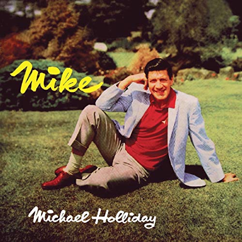 Michael Holliday album cover: man in a suit sitting on grass.
