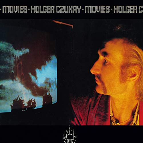 CD cover: man’s profile beside a blue, dreamlike image on a screen.