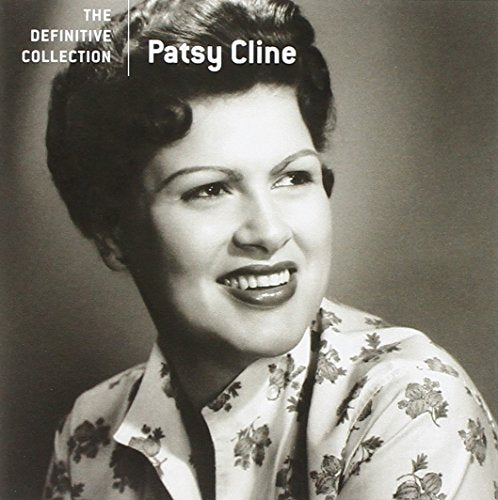 Black and white portrait of singer Patsy Cline smiling gently.