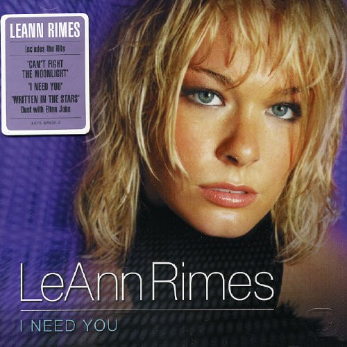 LeAnn Rimes album cover, close-up portrait, purple background, CD format.
