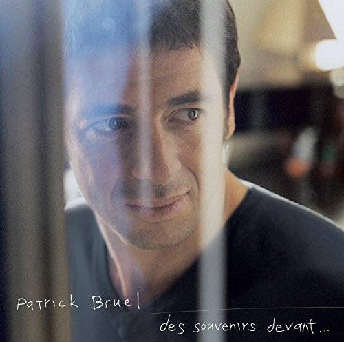 Patrick Bruel album cover, portrait of a man seen through glass.