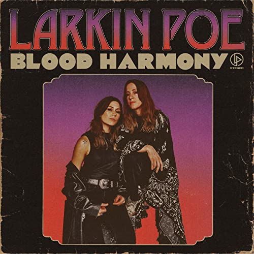Larkin Poe album cover: two women in front of a purple backdrop.