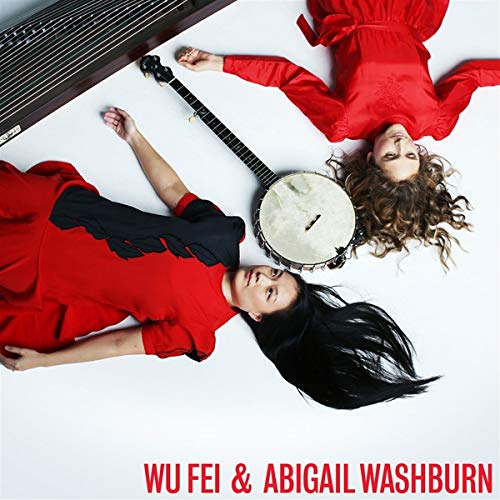 Two musicians lying with instruments, album cover for Wu Fei & Abigail Washburn.