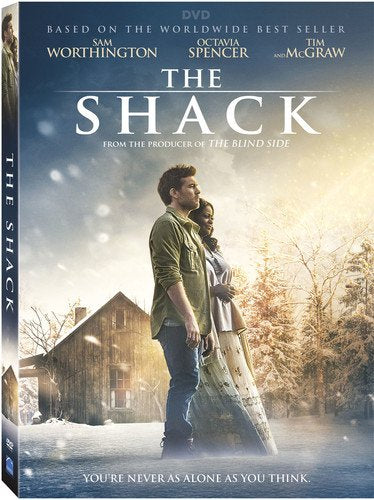 DVD cover for "The Shack" featuring a couple near a rustic cabin.