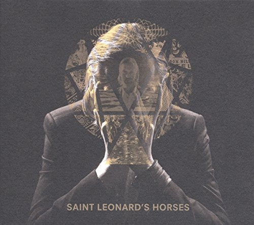 CD cover: man’s face obscured by geometric shapes and layered imagery.