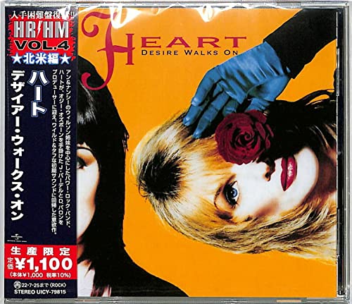 Heart “Desire Walks On” CD cover featuring a woman with a rose.