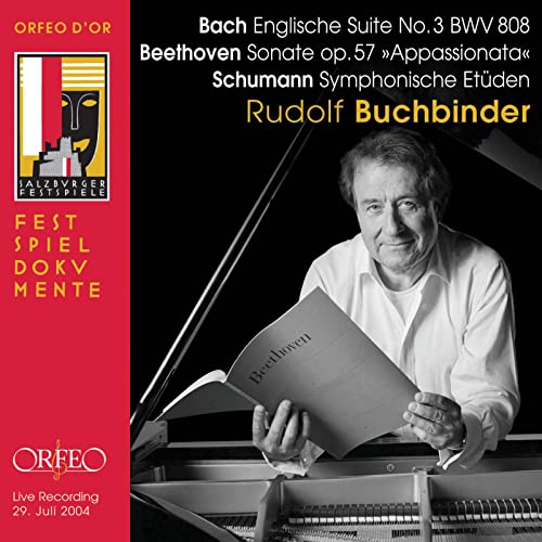 Rudolf Buchbinder at a piano, holding sheet music, CD cover art.