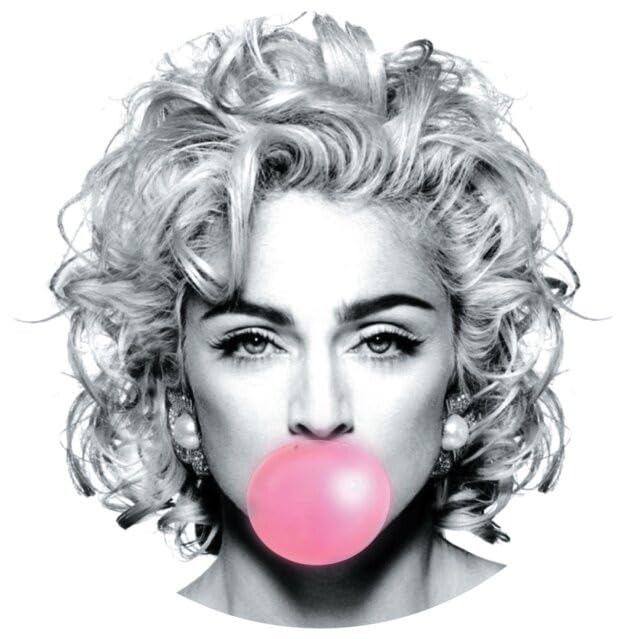 Black and white portrait of Madonna blowing a pink bubblegum bubble.