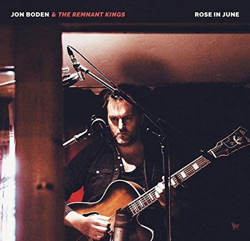 Jon Boden playing guitar with microphones, album cover for "Rose In June".