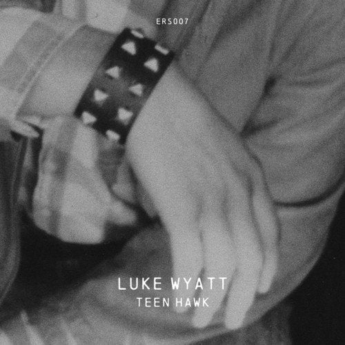 Black and white album cover featuring a wrist with a studded bracelet.