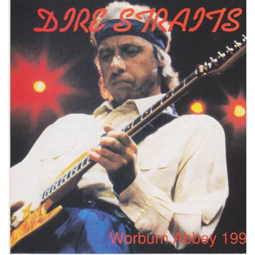 Dire Straits album cover featuring Mark Knopfler playing guitar onstage.