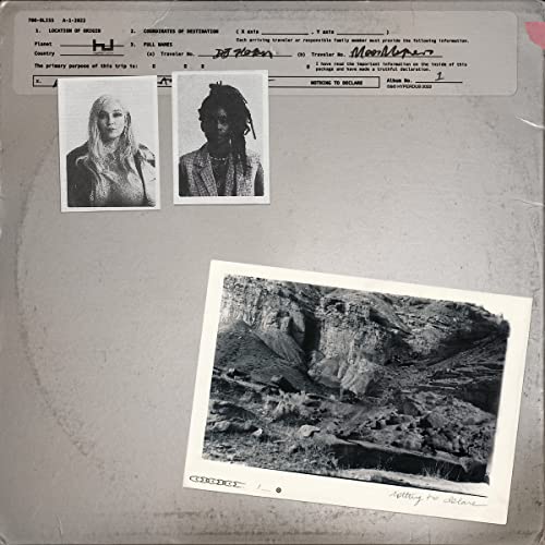 Vinyl record cover with black and white photos of people and landscape.