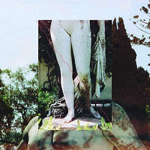 Album cover featuring fragmented classical sculpture against a landscape.