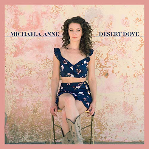 Album cover for Michaela Anne’s “Desert Dove” featuring a woman in cowboy boots.