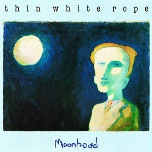 Album cover for Thin White Rope’s “Moonhead” featuring a painted face and moon.