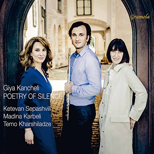 CD cover featuring three people and a flute in an arched doorway.