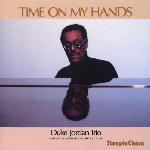 Duke Jordan portrait on CD cover, reflected in a piano surface.